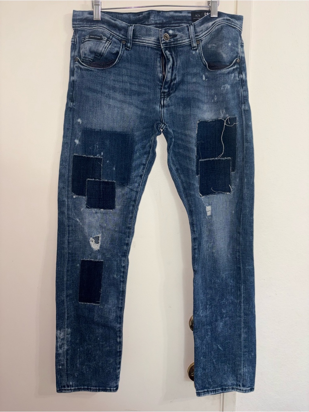 Armani Exchange denim jeans feature a distinct patchwork Distressed Size 33 Slim